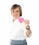 Woman Showing Heart Shaped Paper Stock Photo