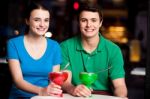 Brother And Sistere Enjoying Ice Cream Outdoors Stock Photo