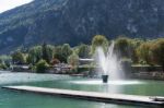 Fountain In Lake Wolfgang At St. Gilgen Stock Photo