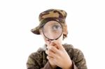 Boy holding magnifying glass Stock Photo