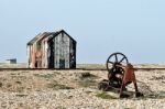 Old Shack And Rusty Machinery On Dungeness Beach Stock Photo