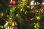 Close Up Big Yellow Glitter Ball Christmas On Tree With Wire White Light Background Stock Photo