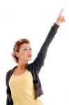 Attractive Woman Pointing Upward Stock Photo