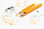 Broken Pencil With Metal Sharpener And Shavings Stock Photo