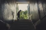 Boy Climbing Stairs Stock Photo