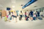 Blurred Crowd Of Tourist In The Airport Stock Photo