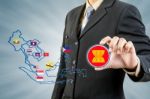 Asean Economic Community In Businessman Hand Stock Photo