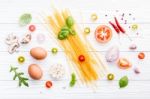 Ingredients For Homemade Pasta On Wooden Background Stock Photo