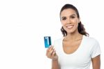 Pretty Woman Showing Credit Card To Camera Stock Photo