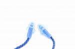 Blue Earplugs With A String On White Background Stock Photo