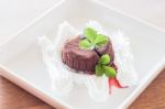 Chocolate Lava With Strawberry Sauce Stock Photo