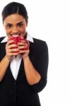 Woman Enjoying Coffee During Work Break Stock Photo