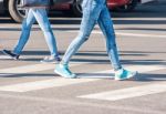 Pedestrians Walking On A Pedestrian Crossing Stock Photo