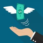 Hand With Money Fly Stock Photo