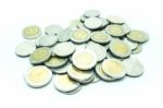 Group Of Thai Baht Coins On White Table Background Stock Photo