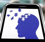 Head Puzzle On Smartphone Shows Smartness Stock Photo