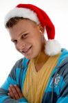 Smiling Male Wearing Santa Hat Stock Photo