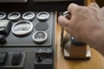 Commander Hands On The Boat Wheel Stock Photo