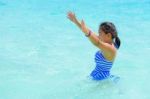 Happy Girl In The Sea Stock Photo