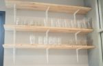 Front View Of Glass Wooden Shelf Stock Photo