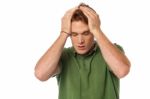 Man Having Severe Headache Stock Photo