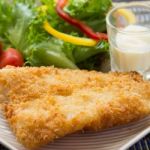 Fried Fish And Salad Stock Photo