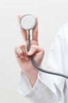 Doctor Holding Stethoscope Stock Photo