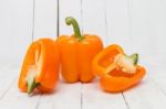 Fresh And Colorful Orange Bell Peppers Stock Photo