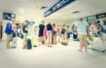 Blurred Crowd Of Tourist In The Airport Stock Photo