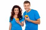 Couple Drinking Orange Juice Stock Photo