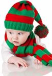 Baby With Christmas Hat And Scarf Stock Photo