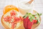 Glass Of Yogurt With Fresh Mix Fruit Stock Photo