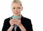 Businesswoman Drinking Coffee Stock Photo