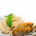 Italian Gnocchi With Seafood Sauce With Crab And Basil Stock Photo