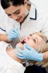 Dentist Whitening A Patient Teeth Stock Photo