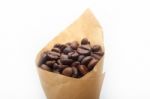 Espresso Coffee Beans On A Paper Cone Stock Photo