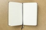 Blank Opened Notebook With Bookmark Ribbon Stock Photo