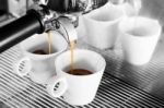 Prepares Espresso In Coffee Shop With Black And White Background Stock Photo