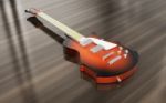 Orange Electric Guitar Stock Photo