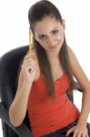 Young Girl Thinking with Pencil Stock Photo