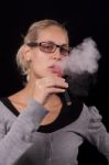 Women Smoking Electric Cigarettes Stock Photo