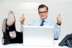 Businessman Showing Thumb Up Stock Photo