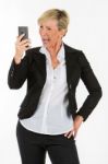 Manager Woman Holding A Smartphone Stock Photo