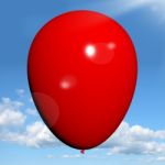 Red Balloon Flying On Sky Stock Photo