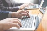 Businessman Team Working At Office Desk And Using A Digital Comp Stock Photo