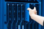 Man Fix Server Network In Data Center Room Stock Photo