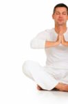 Man Is Practicing Yoga Stock Photo