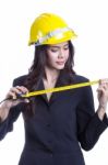 Young Engineer Holding A Cartridge Meter Stock Photo