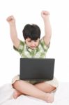 Cute Little Boy With Laptop Stock Photo