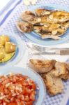 Grilled European Seabass With Potato And Tomato Salad Stock Photo